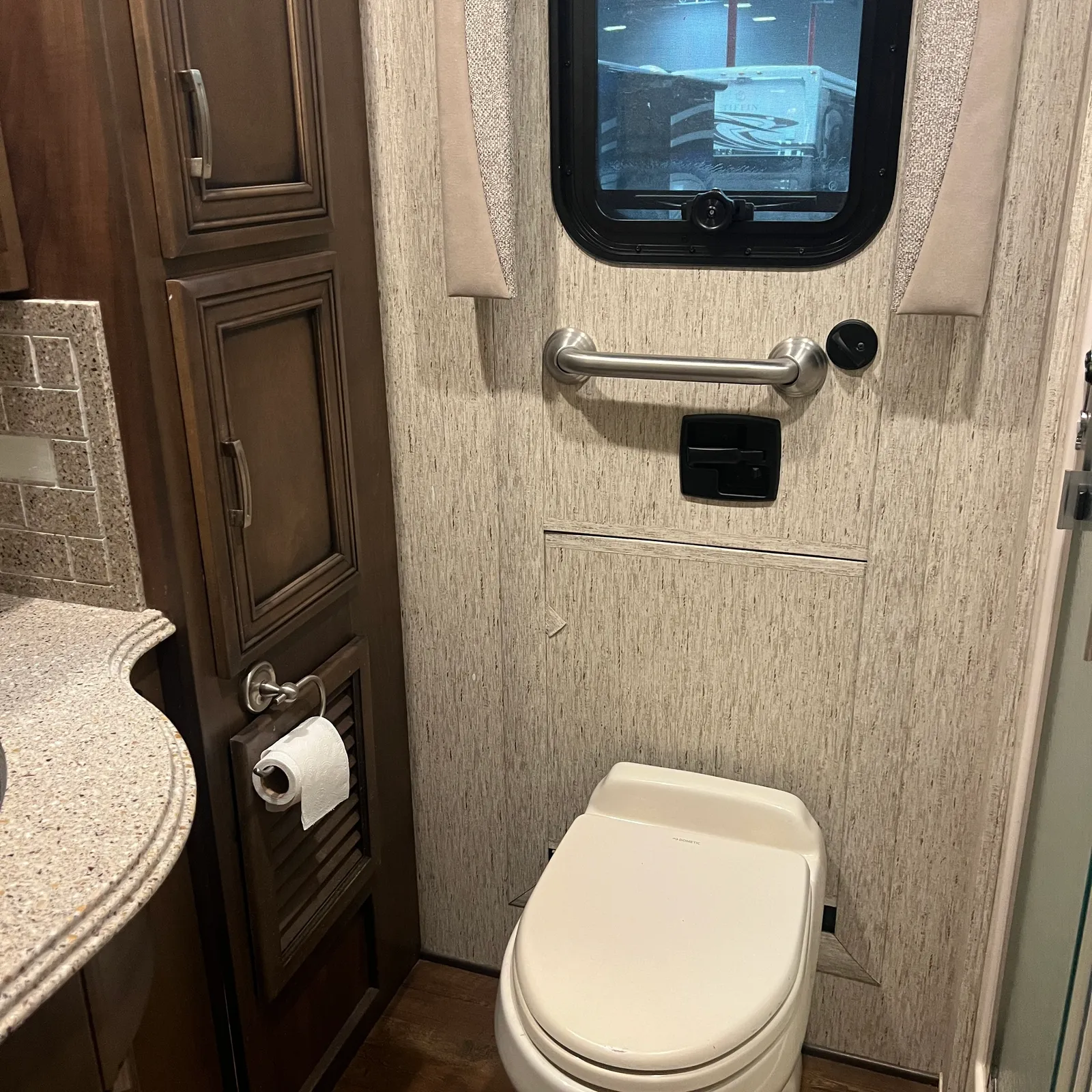 2019 Newmar Ventana 4045 Class A Diesel Pusher motorhome, bathroom with toilet, sink, grab bar, and window