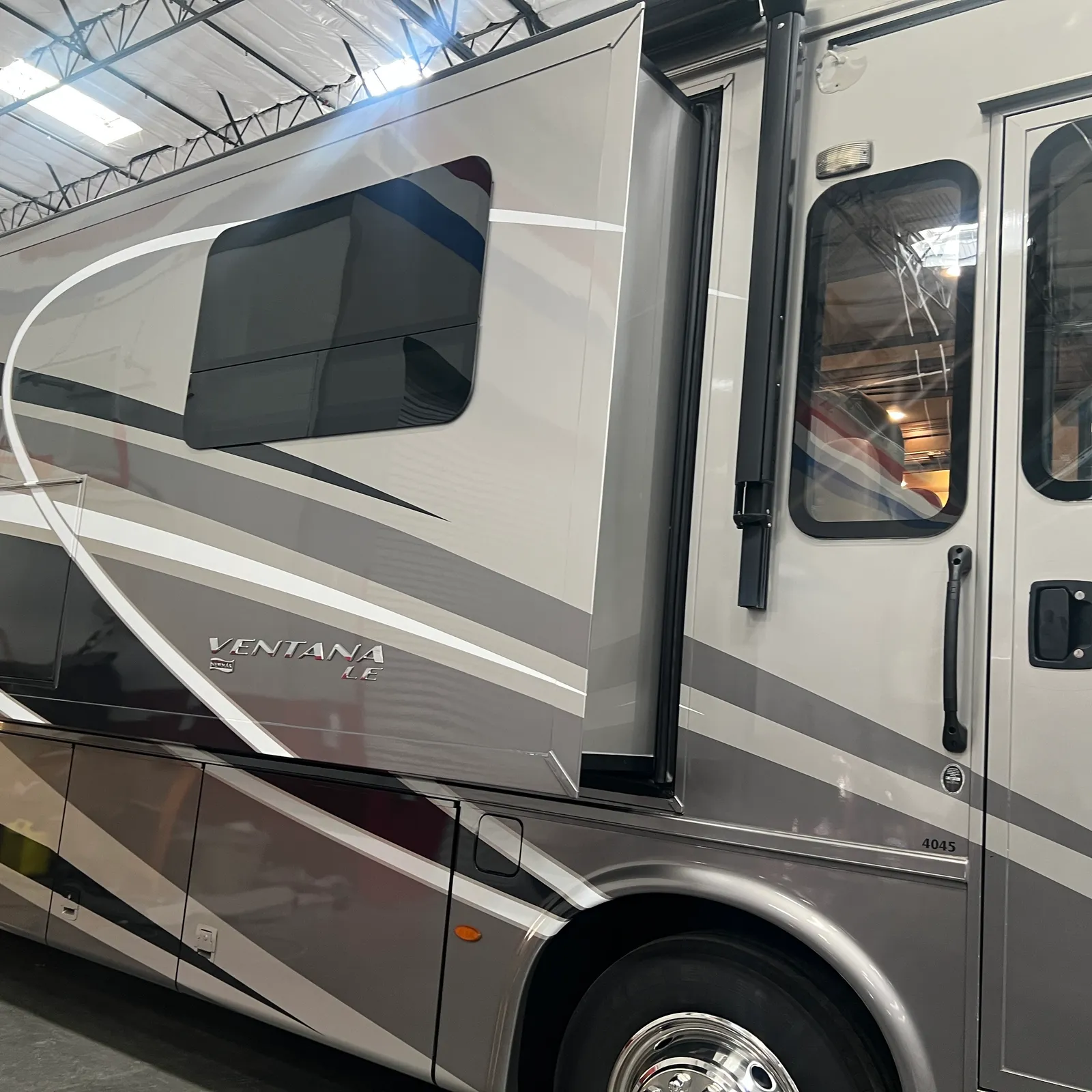2019 Newmar Ventana 4045 Class A Diesel Pusher motorhome, motorhome exterior showing side profile with windows and entry door