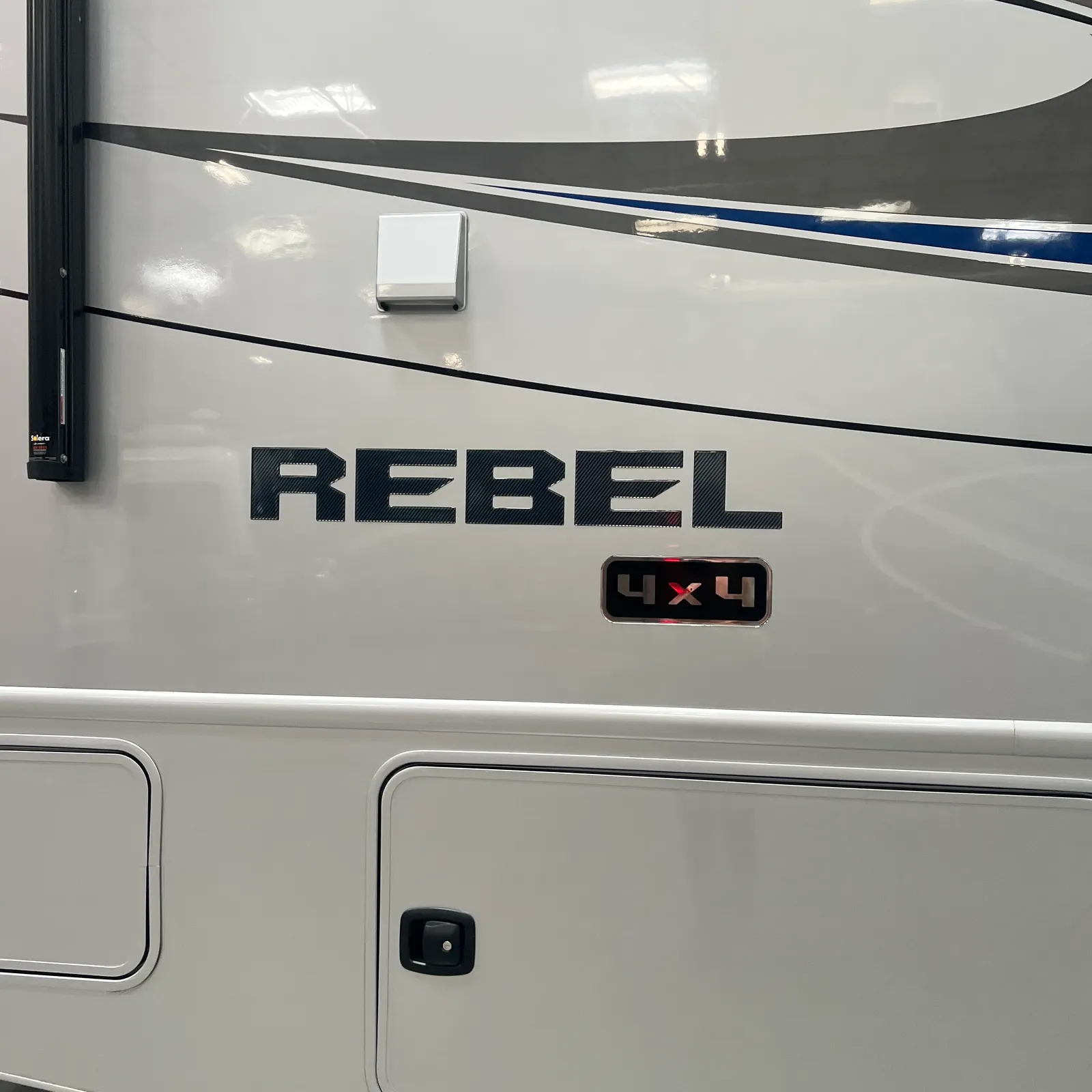 2027 Nexus Rebel AIR 34R Super C motorhome, motorhome exterior with rebel and 4x4 badging