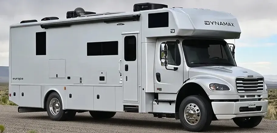 2027 Dynamax Corp Europa 31SS Super C motorhome, white motorhome with extended cab and slide-out sections